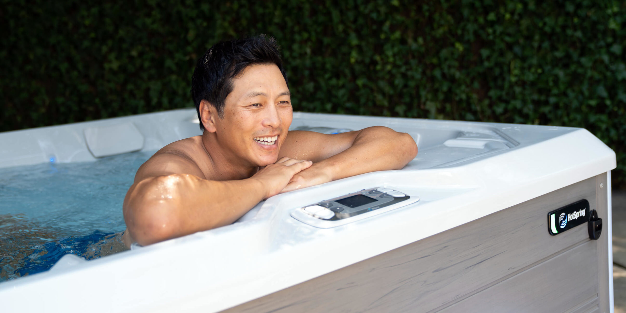 https://www.hotspring.com/wp-content/uploads/2022/03/hot-spring-spas-limelight-collection-page-cspot-lifestyle-man-in-spa-scaled.jpg