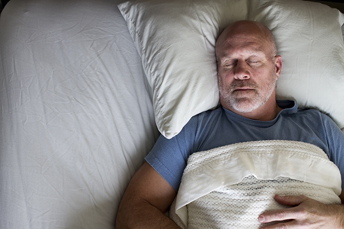 an image of a man who struggles to fall asleep quickly