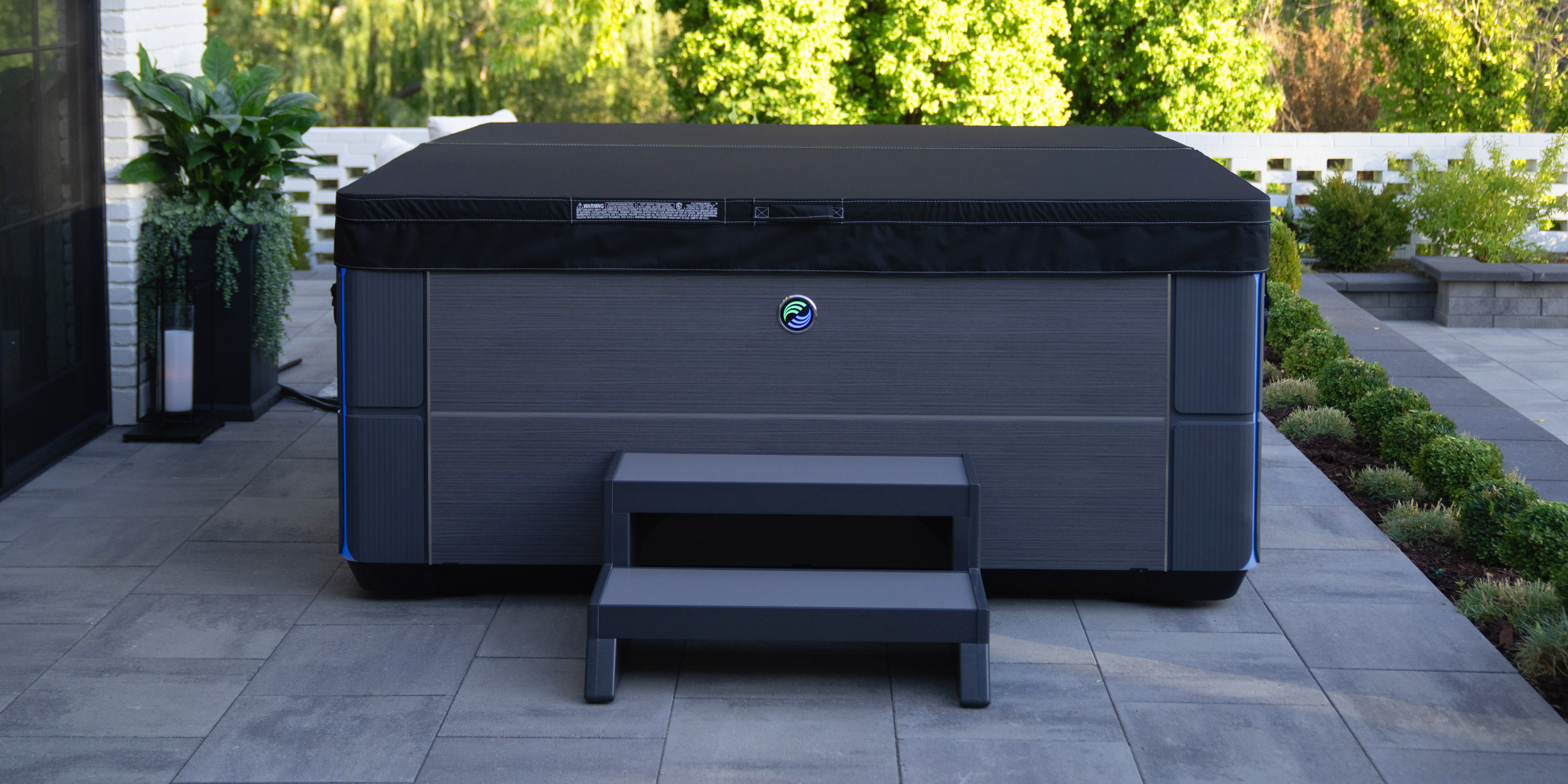 https://www.hotspring.com/wp-content/uploads/2022/03/hot-spring-highlife-aria-alpinewhite-charcoal-withcover-cspot.webp